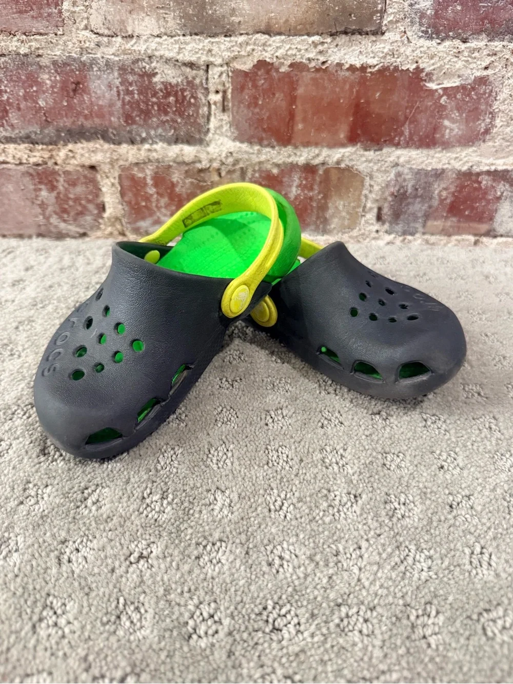 CROCS Kids Black Clog with Lime Green Footbed and Yellow Heel Strap